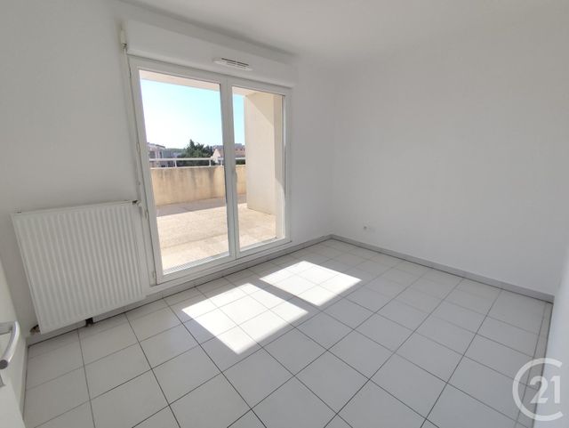 Appartement T4 à louer - 4 pièces - 83.42 m2 - NIMES - 30 - LANGUEDOC-ROUSSILLON - Century 21 Dhuoda