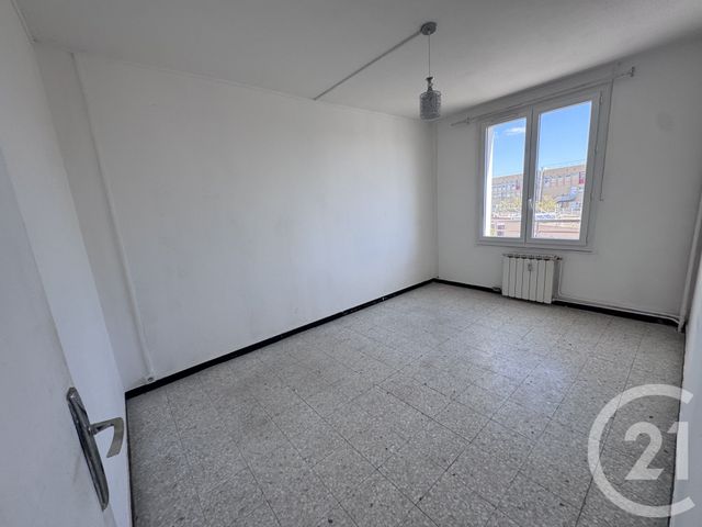Appartement T4 à vendre - 4 pièces - 69.0 m2 - NIMES - 30 - LANGUEDOC-ROUSSILLON - Century 21 Dhuoda