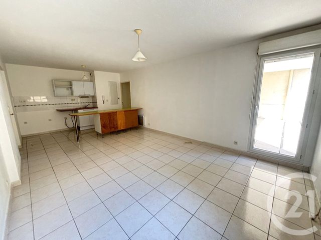 Appartement T3 à louer - 3 pièces - 55.02 m2 - NIMES - 30 - LANGUEDOC-ROUSSILLON - Century 21 Dhuoda