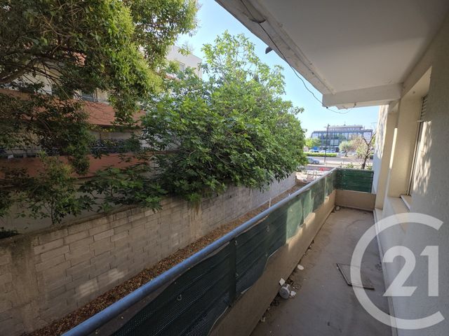 Appartement T3 à vendre - 3 pièces - 57.12 m2 - NIMES - 30 - LANGUEDOC-ROUSSILLON - Century 21 Dhuoda