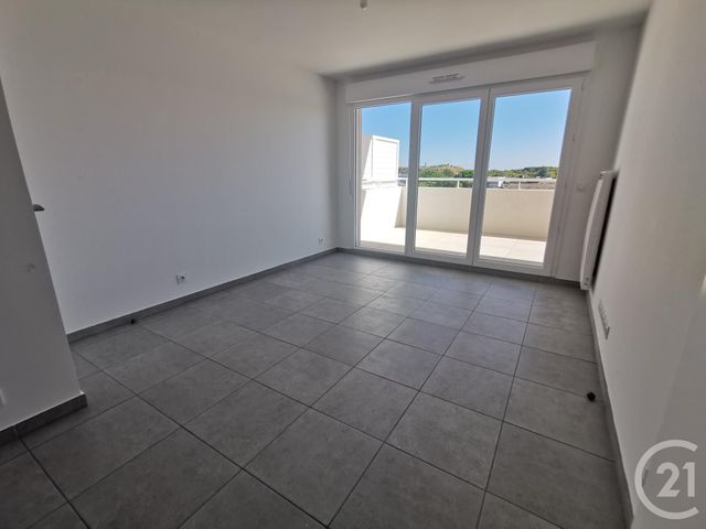 Appartement T2 à louer - 2 pièces - 39.01 m2 - NIMES - 30 - LANGUEDOC-ROUSSILLON - Century 21 Dhuoda